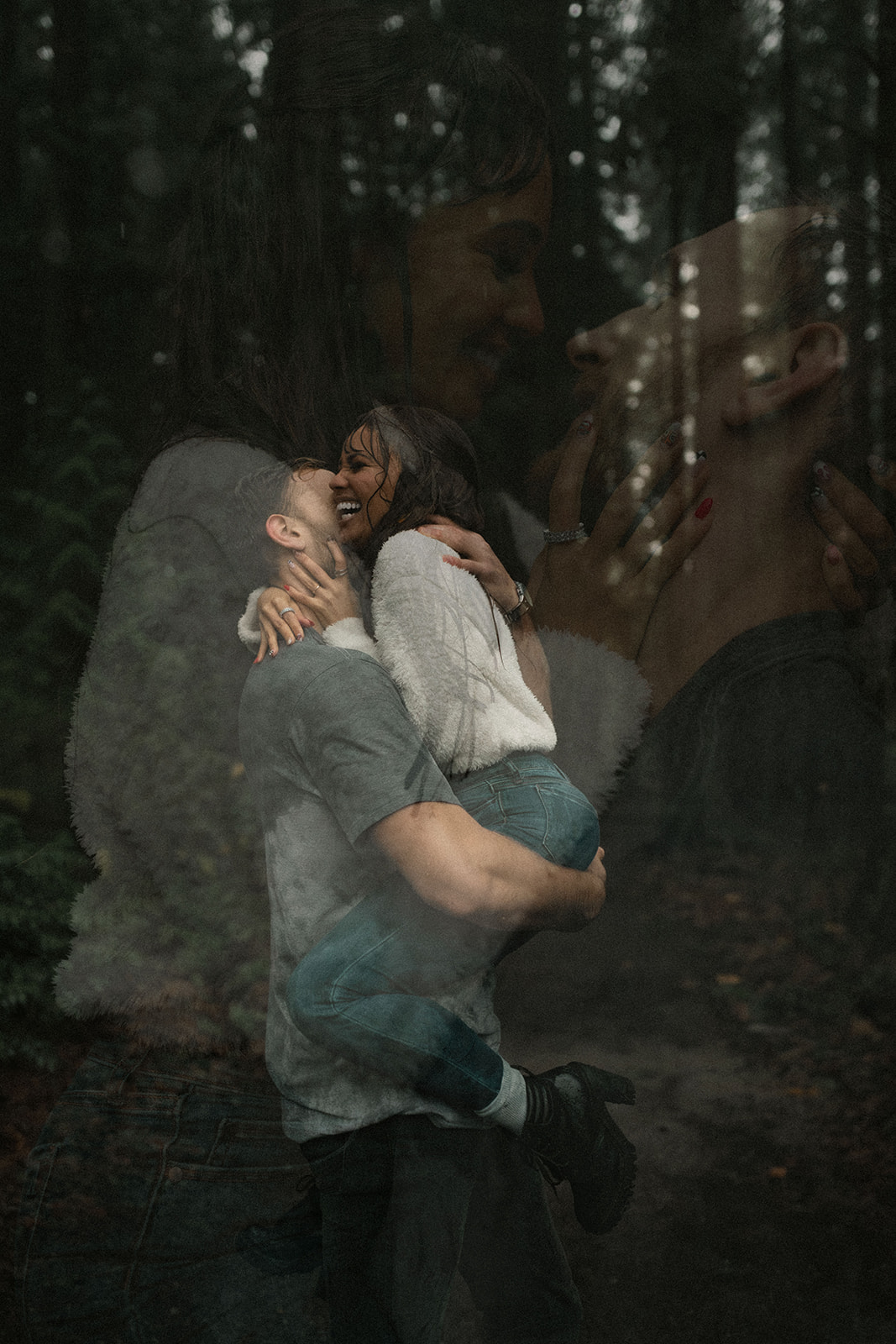 A playful moment captured as the couple engages in light-hearted banter. The man holds the woman aloft, and their laughter is contagious, representing a wonderful idea for a fun couple photoshoot. The damp surroundings and their soaked clothing add to the authenticity of this rainy day couple picture, demonstrating how the rain can enhance romantic moments.