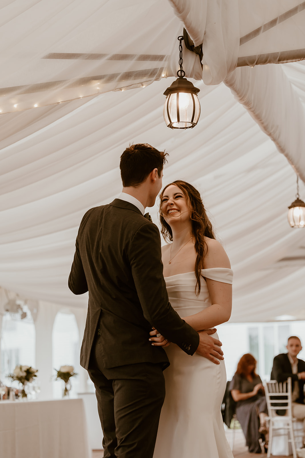 Bride and groom dancing during their wedding reception