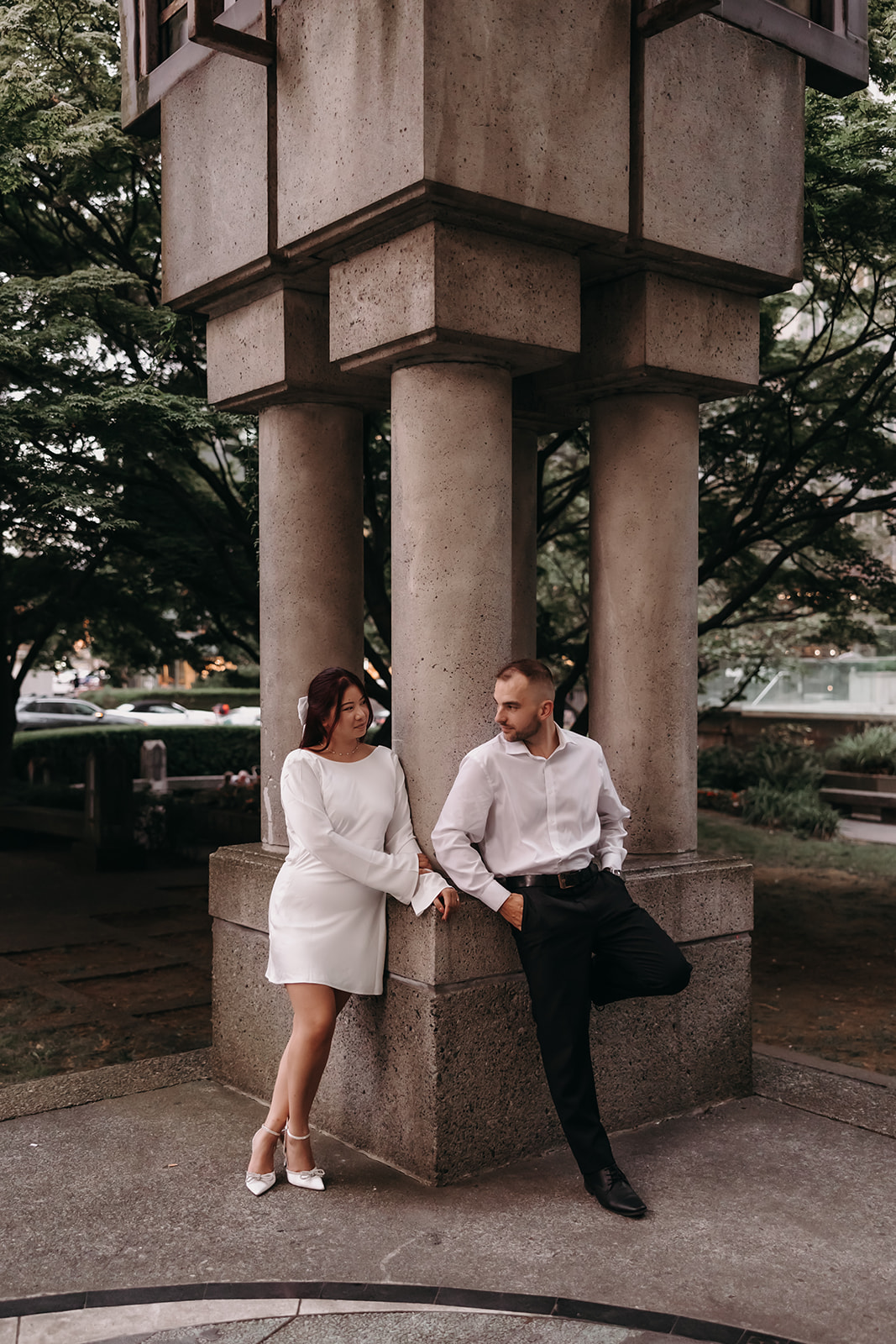 Couple posing for their city engagement photos