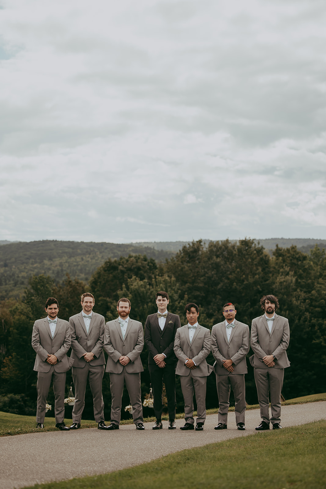 Groom and groomsmen posing for a picture