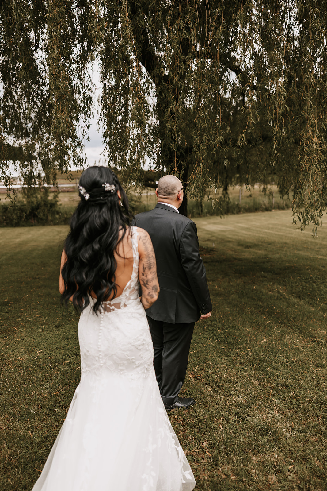 Bride and father of bride first look