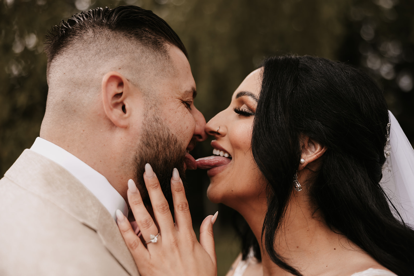 Bride and groom posing for portraits