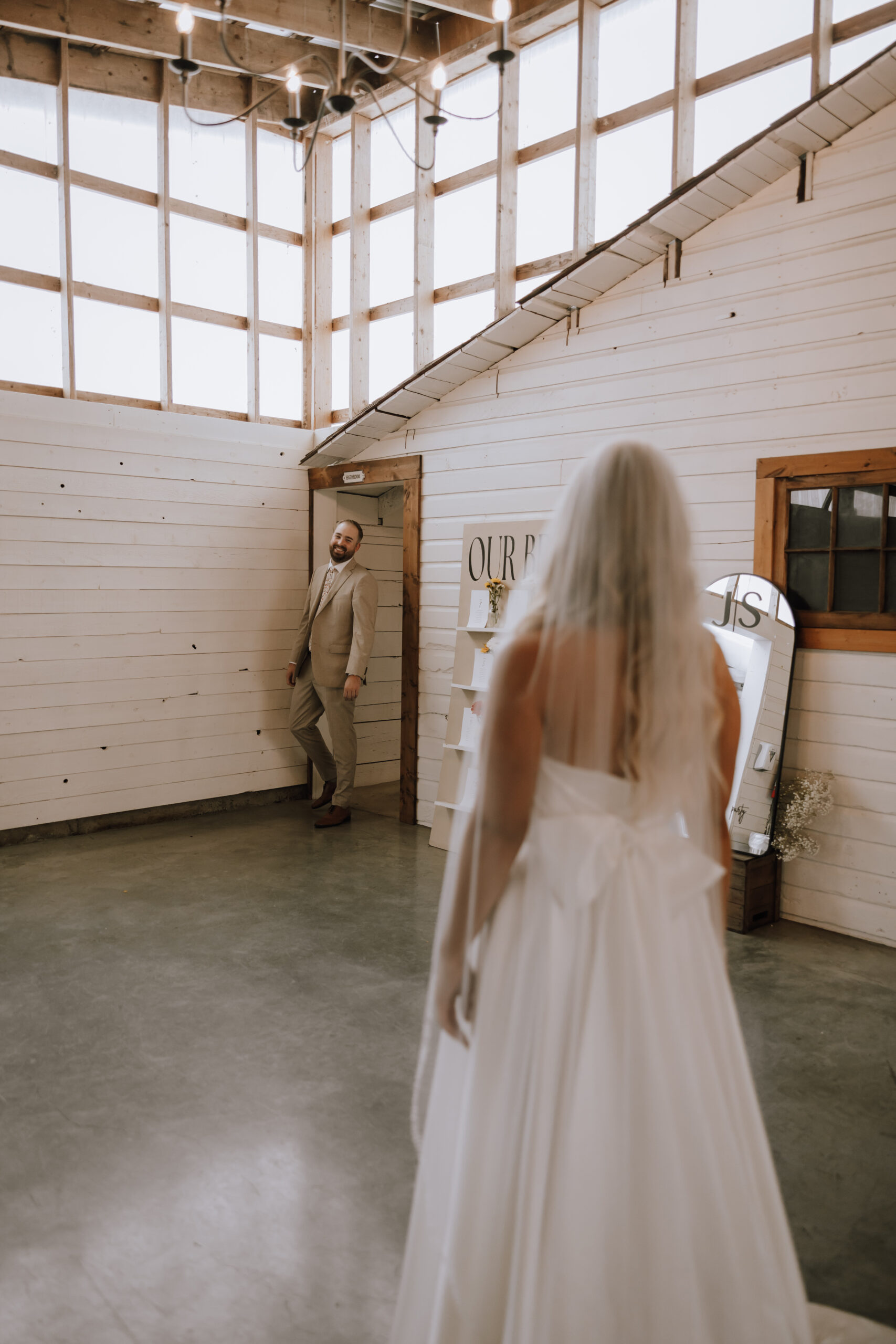 Groom walking out seeing the bride for the first time