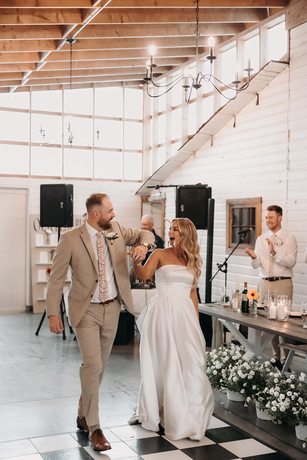 Bride and groom doing their entrance to the wedding reception