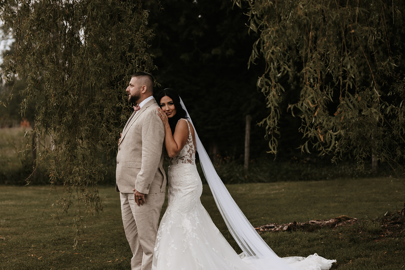 Bride and groom posing for portraits