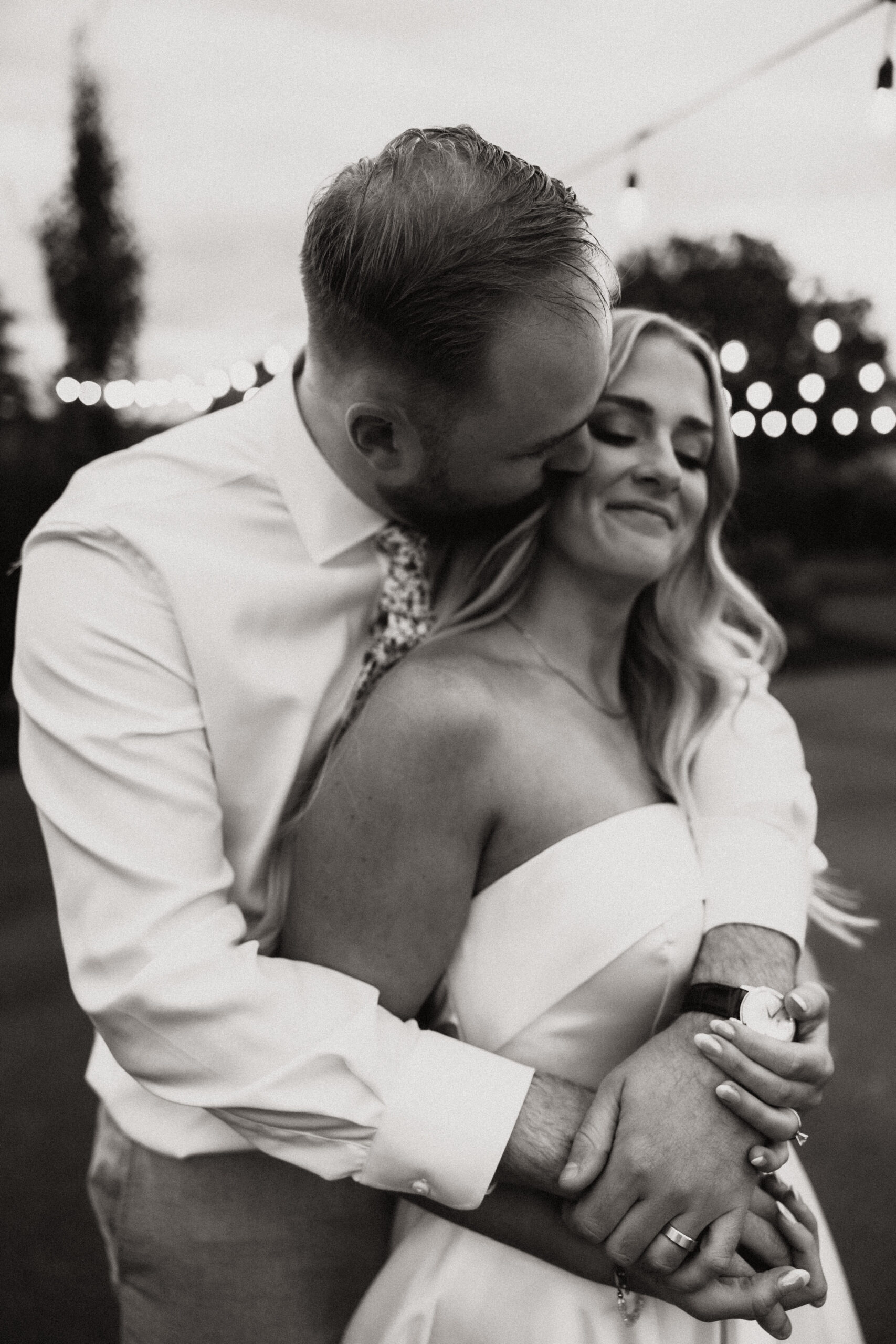 Bride and groom embracing