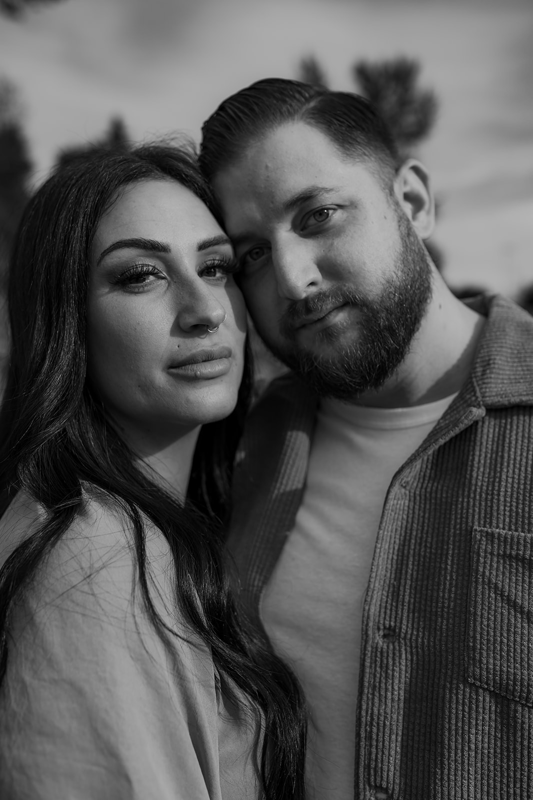 Engagement session portrait of a couple with an intimate, close-up shot showing love and connection during their outdoor adventure.